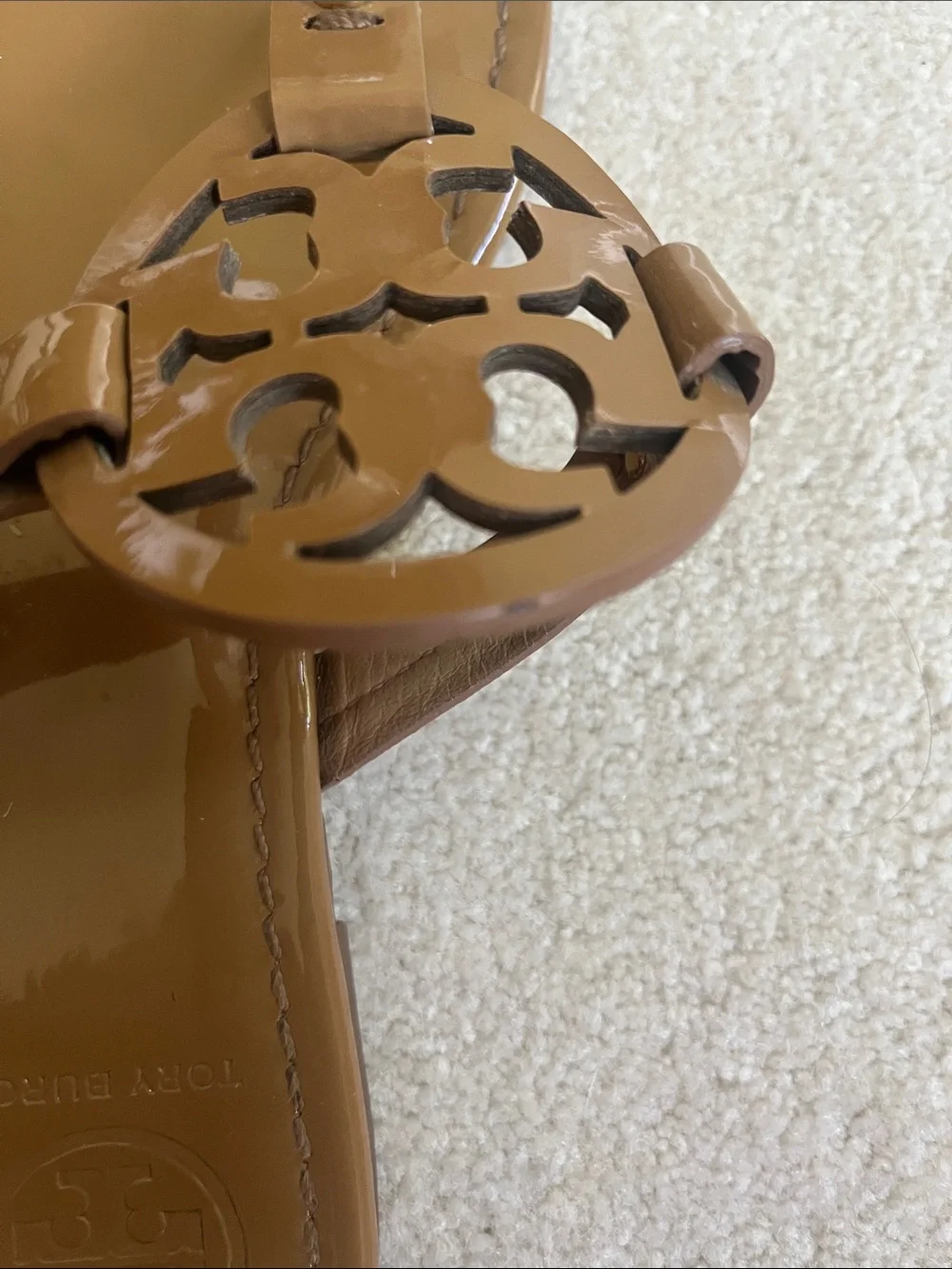 Tory Burch Patent Logo Thong Sandals in Brown
